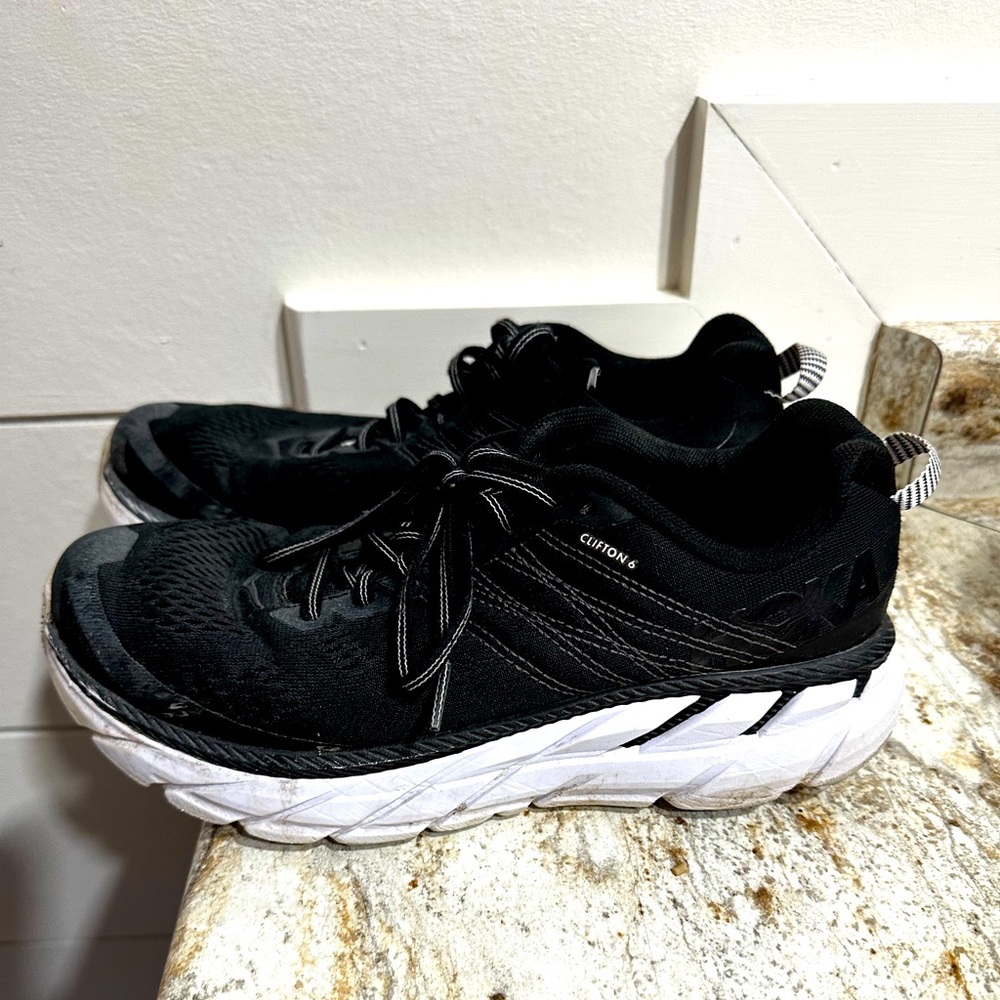 Pair of black size 8 Hoka’s, great used shape